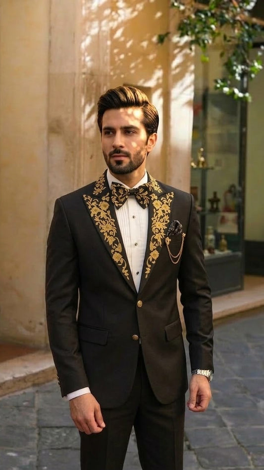 Black suit with peaked Golden embroidered lapel
