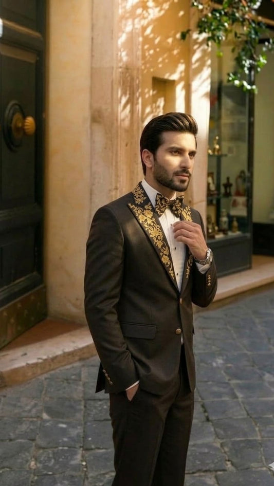 Black suit with peaked Golden embroidered lapel